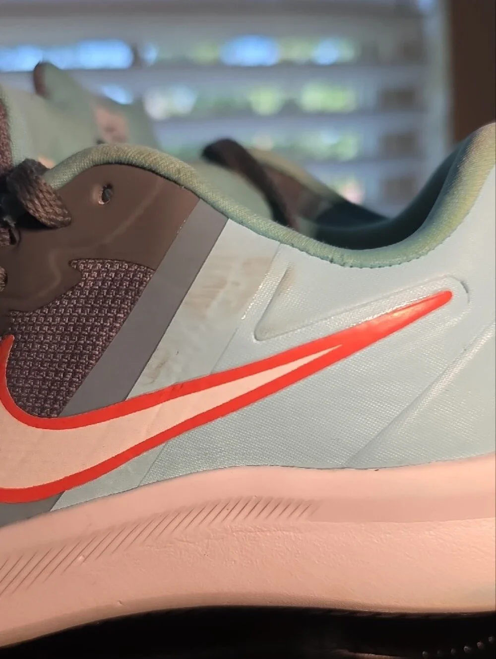 Nike Boys Youth Athletic Shoes in Light Blue, Gray, White with Orange Swoosh
